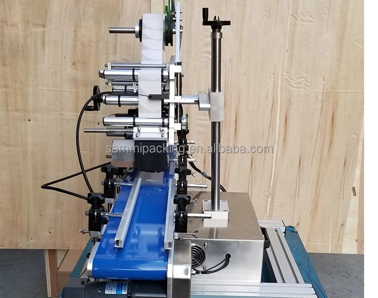 Applicatore automatico di etichettatura adesiva per scrivania a superficie piatta