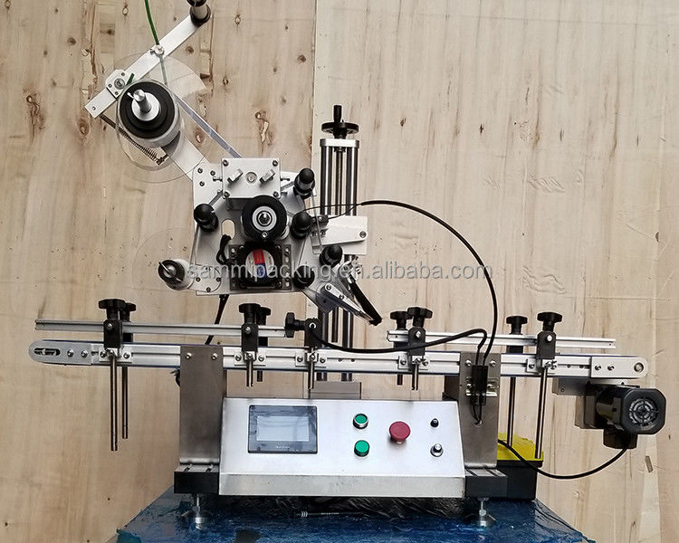 Applicatore automatico di etichettatura adesiva per scrivania a superficie piatta