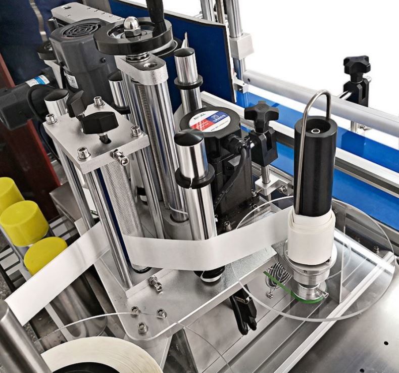 Il prezzo più basso e la vendita calda macchina di etichettatura automatica da tavolo per bottiglia rotonda