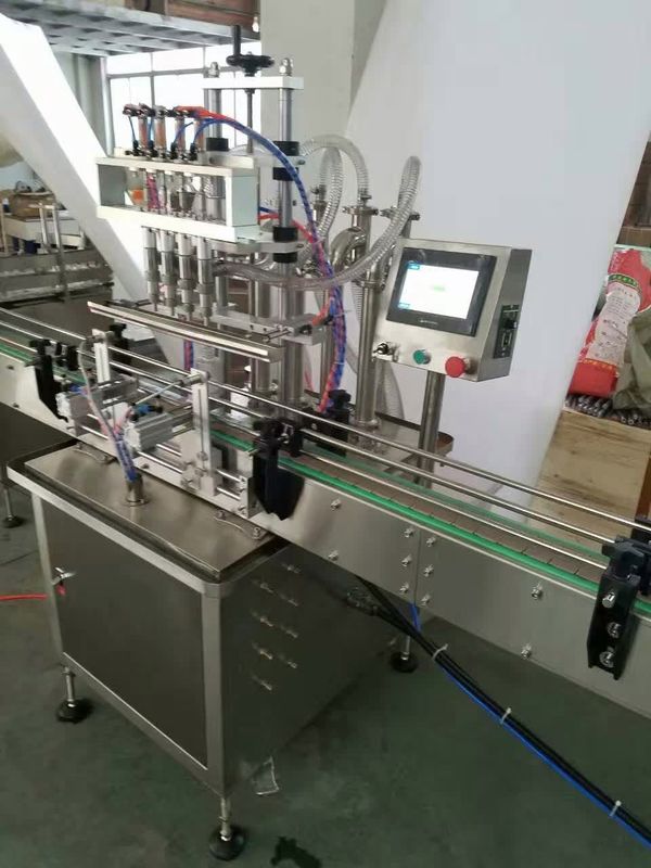 Macchina di riempimento in linea a 4 ugelli Macchina di riempimento liquido a sovrafflusso automatico Riempitore di bottiglie liquide per succo di bevande