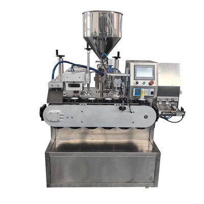 Macchina automatica pneumatica per riempimento e sigillatura di tubi in alluminio per pomate a doppia camera
